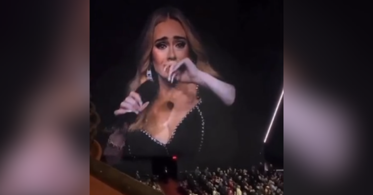 adele crying onstage at concert