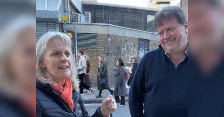 A woman named Sue smiles as she talks. Her husband, Alex, smiles at her lovingly with a look of admiration in his eyes.