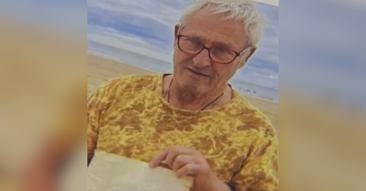 Printed out French news article with a photo of the retired French man who found Ben Lyons' letter. He's posing with the letter on the beach.
