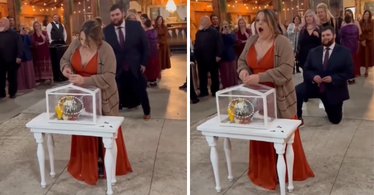 woman using key to open box at wedding as man gets down on his knee behind her