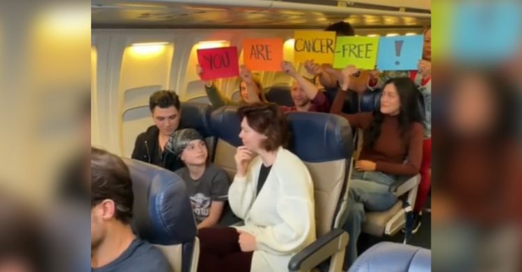 A boy finds out he's cancer-free on an airplane.