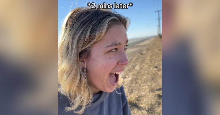 A woman stares in shock at something we can't see in the image. Her mouth is wide open and she looks on the verge of tears. Text on the image reads: *2 minutes later*