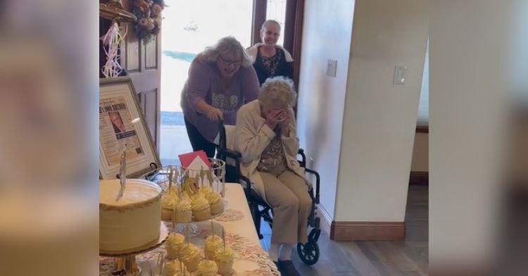 A 100-year-old grandma cries at her surprise birthday party.
