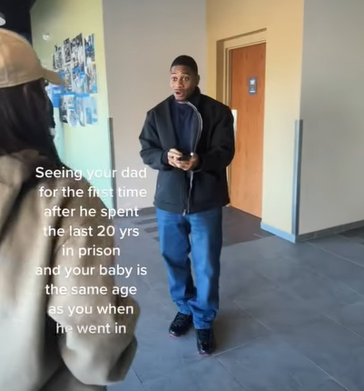 Man's eyes are wide as he spots his daughter who is walking up to him. Text on the image reads: Seeing your dad for the first time after he spent the last 20 yrs in prison and your baby is the same age as you when he went in.