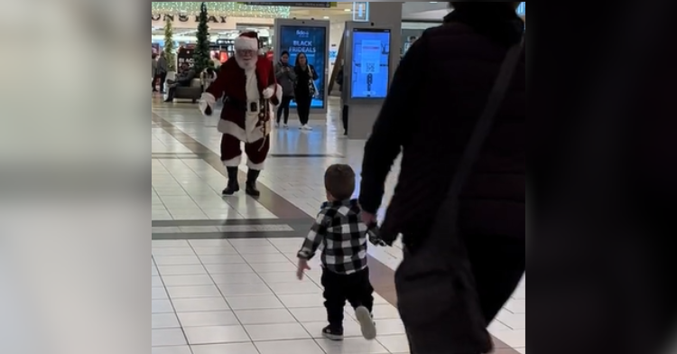 toddler runs to santa