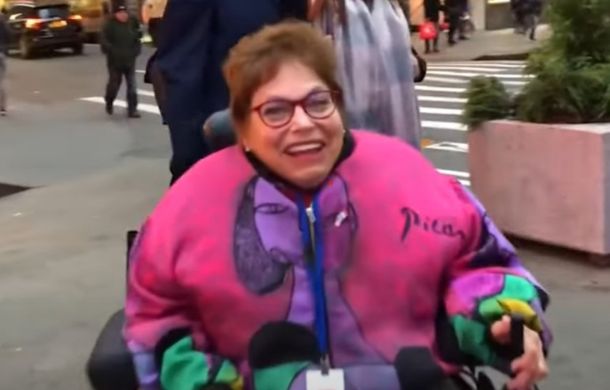 Activist Judy Heumann cruising around New York during a conference on disability rights.