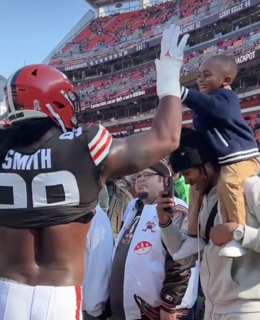 NFL Player and his top Fan... his son!