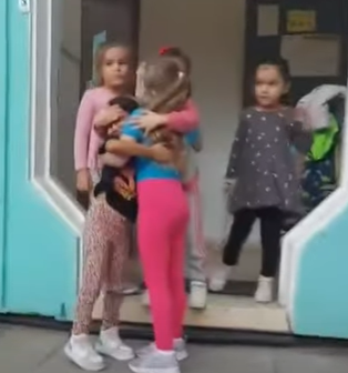 israeli hostage hugging classmates