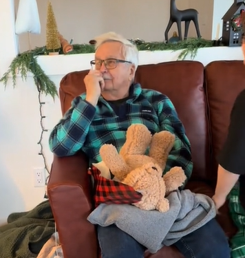 grandpa holding teddy bear