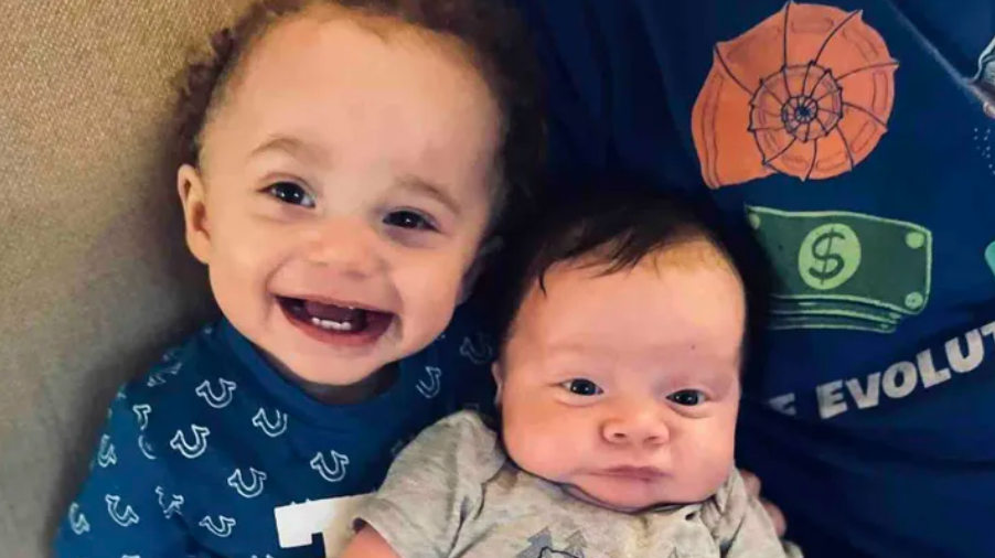 Princeton and Lord, the baby who was recently sucked up by a tornado in Tennessee lay on their backs for a photo.