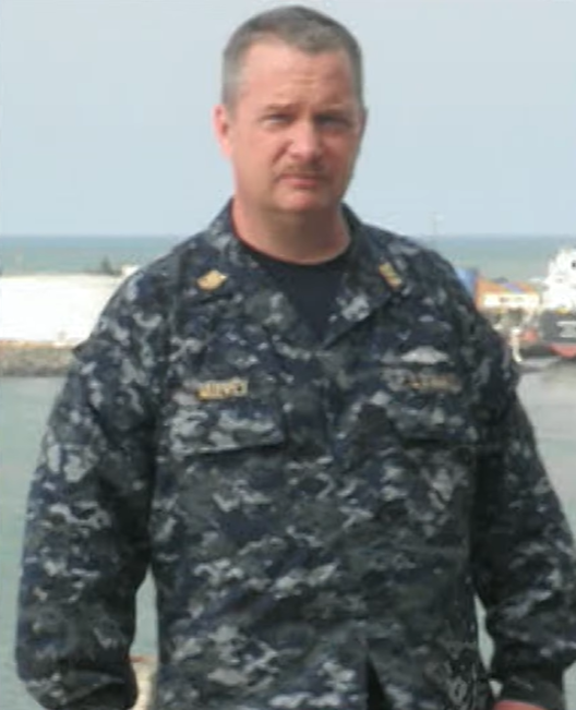 Disabled veteran John Mulvey in uniform, posing for a photo.