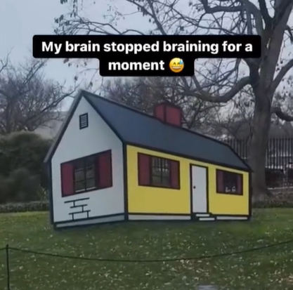 This house sculpture is actually a very impressive optical illusion.