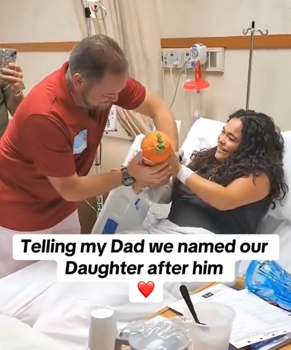 woman's father crying after newborn is named after him