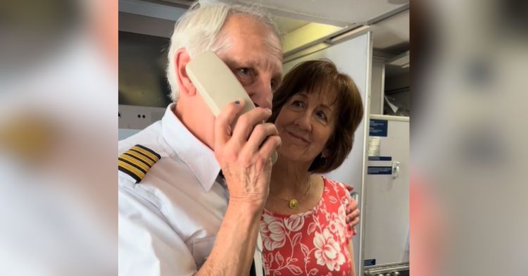 A retiring pilot gives a speech next to his wife on his last flight.