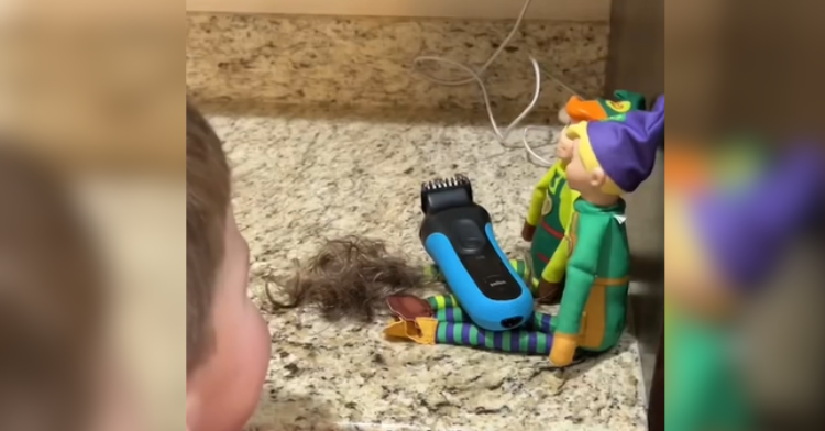 little boy looks at elves with shaver