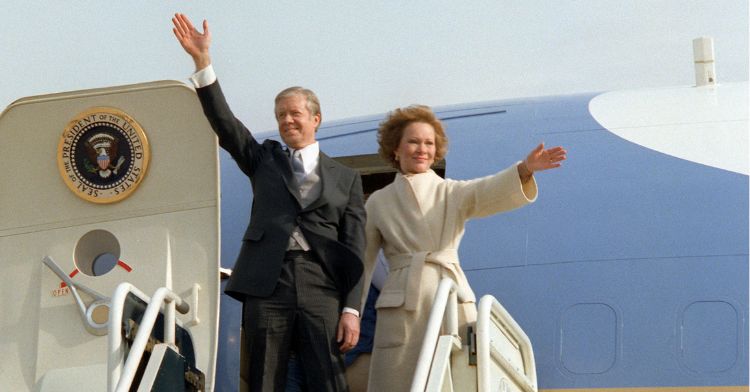 President Jimmy Carter and his wife, Rosalynn Carter, descending from an airplane.