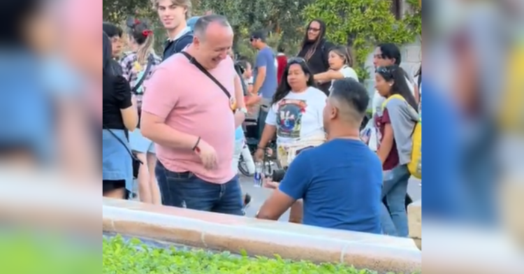 man proposing to man at disney