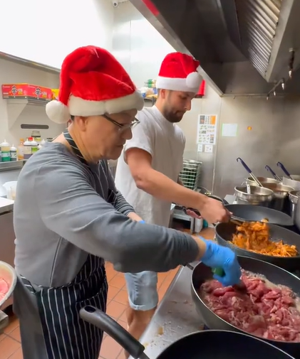 Jimmy Darts and a restaurant owner cook meals for the homeless. 
