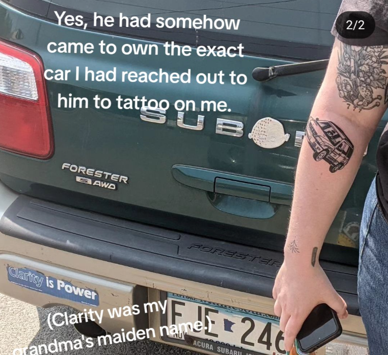 View of the tattoo artist's Subaru from the back. We can see both the "Clarity is Power" sticker and the arm of the grandchild who got the tattoo. The Subaru tattoo is black and beautifully detailed. 

Text on the image reads: Yes, he had somehow came to own the exact car I had reached out to him to tattoo on me. 

(Clarity was my grandma's maiden name)