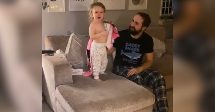 toddler crying on couch