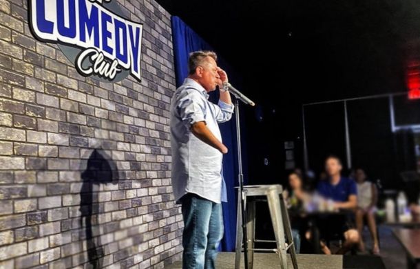 Mike Bolland doing stand-up comedy.