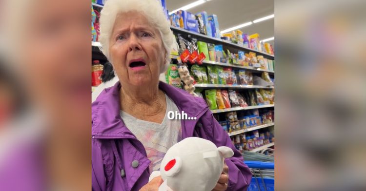 An elderly woman gets emotional when a stranger gives her a gift.