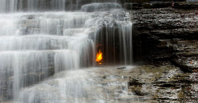 There is fire behind a waterfall at Eternal Flame Falls.