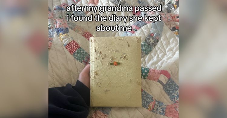 A girl holds her grandma's old diary.