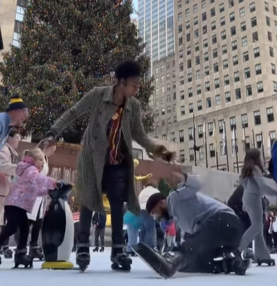 A man falls on the ice while trying to pull off a holiday proposal.