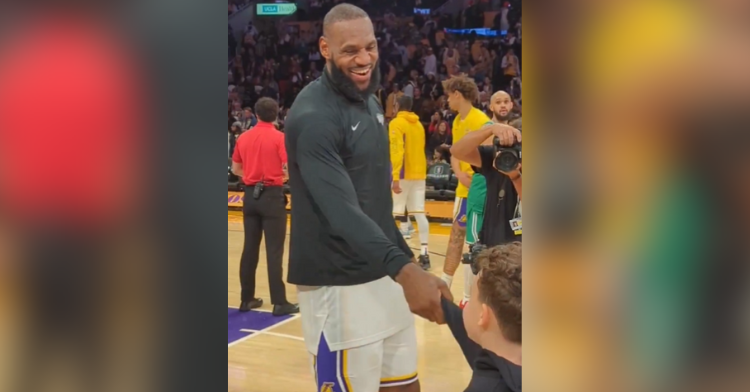 lebron james shakes kid's hand