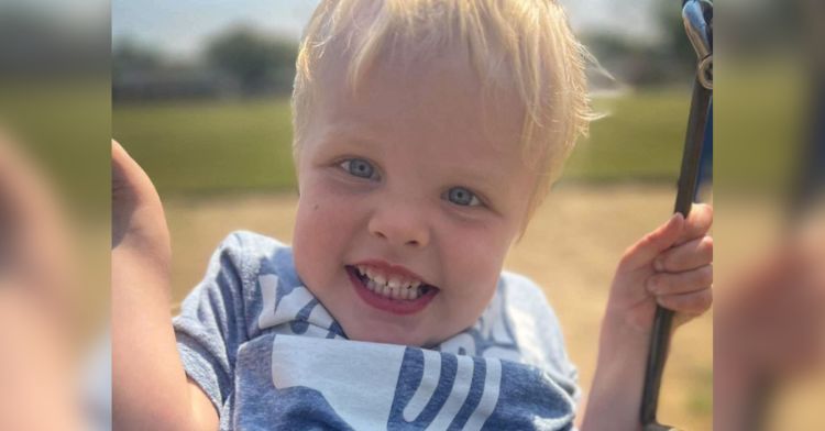 A four-year-old boy with blonde hair and blue eyes.