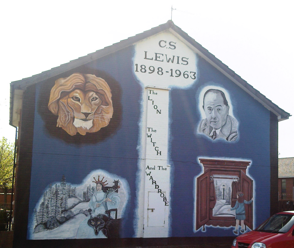 A C.S. Lewis mural on the side of a building. It includes images of C.S. Lewis, a lion, and other "Narnia" imagery. It also reads: C.S. Lewis. 1898-1963