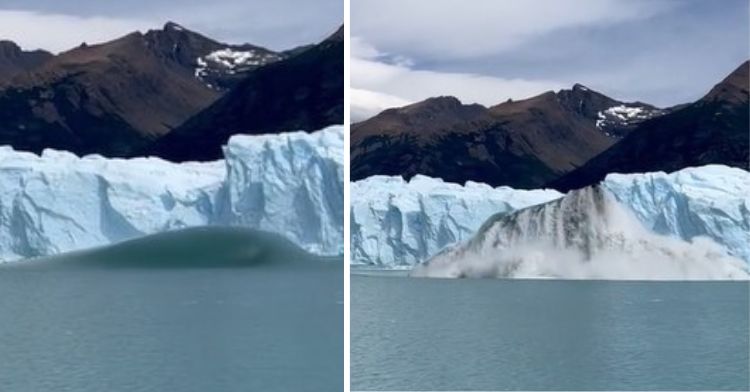 An iceberg dramatically rises to the surface of the ocean.