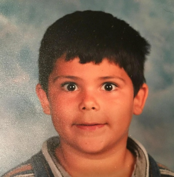 This funny school picture shows a boy who was told not to blink. The wide-eyed stare suggest perhaps too much caffeine before school.