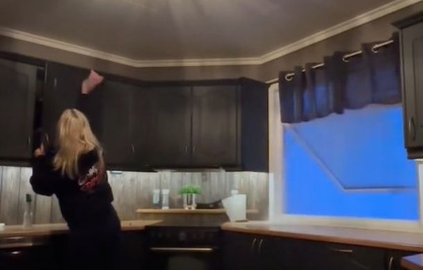 Happily cleaning with an open window, a Norwegian housewife is about to develop extreme anxiety.