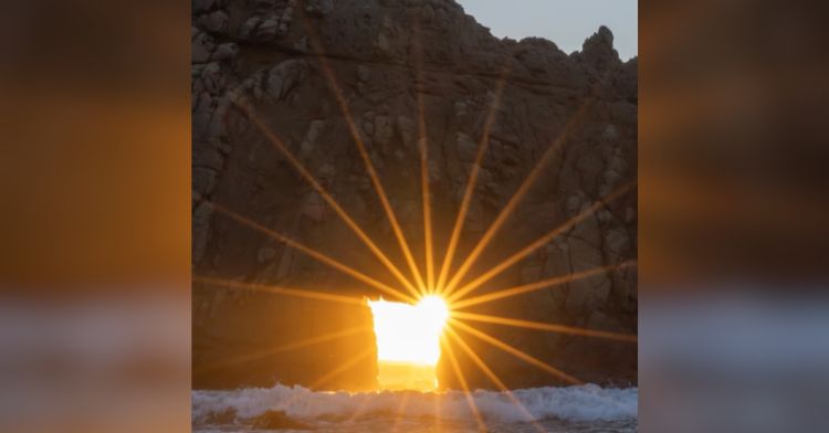A gorgeous phenomenon where the sunset lines up with the keyhole in a natural arch.
