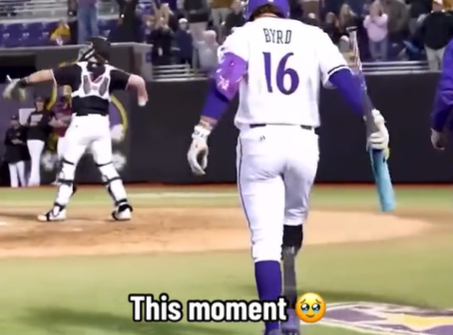 Parker Byrd walks onto the baseball field with his prosthetic leg.