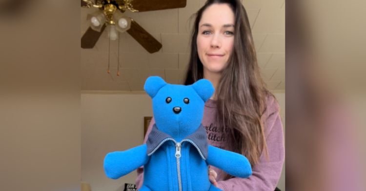 A blue memory bear made from a deceased sister's sweater.