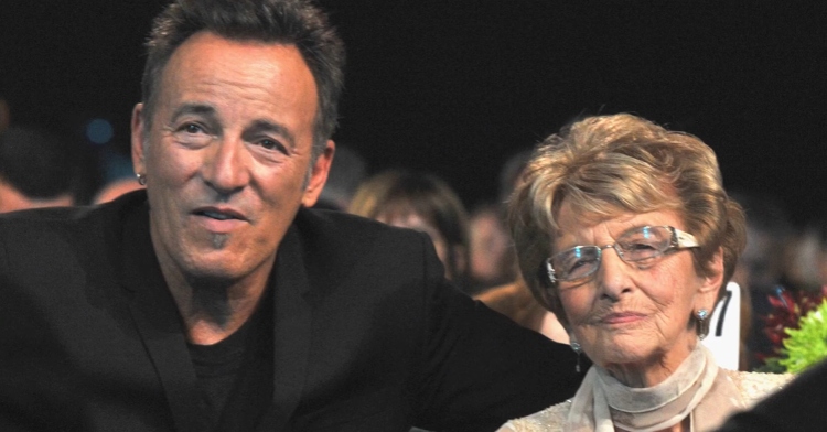 Bruce Springsteen and his mom, Adele, sit together at an event.