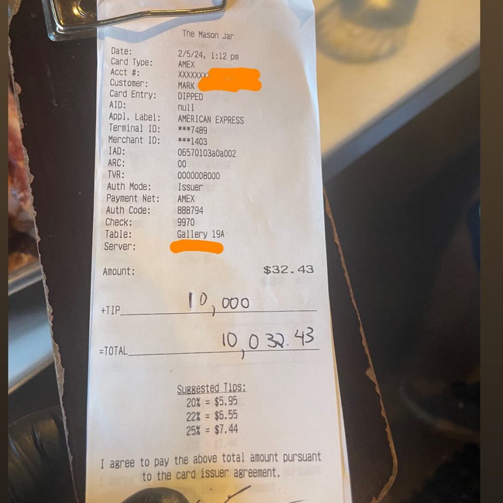 A receipt from a restaurant with a $10,000 tip.