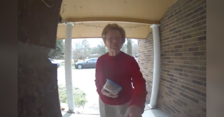 old lady at doorbell