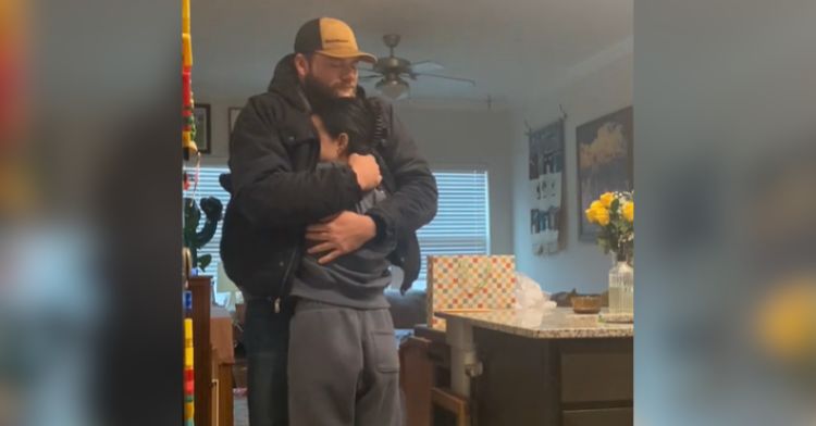A man hugs his wife after finding out she's pregnant despite infertility issues.