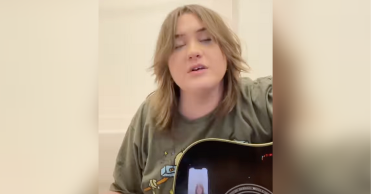ruby leigh with guitar