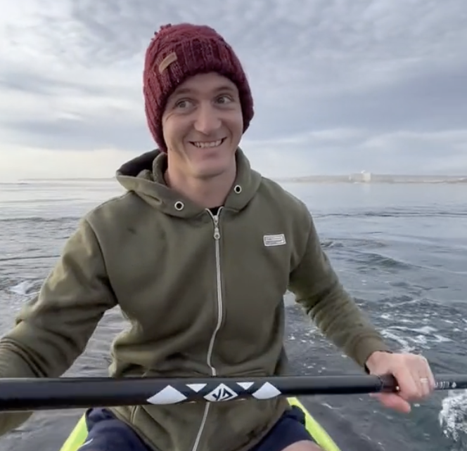 scared man on paddleboard