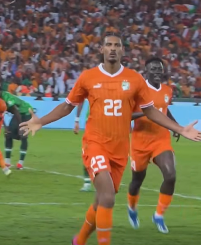Sébastien Haller takes a victory lap after scoring.