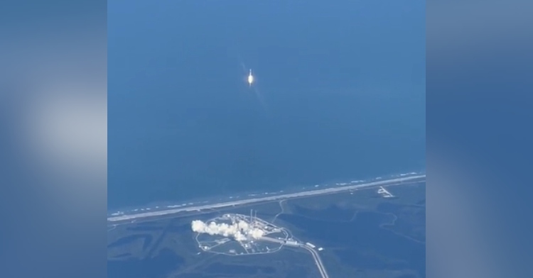 View of a SpaceX rocket, Flacon 9, taking off in Florida. This is from the perspective of someone on an airplane.
