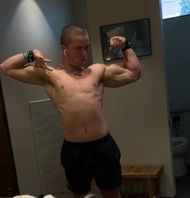 Body builder Hunter Moore flexes his muscles.