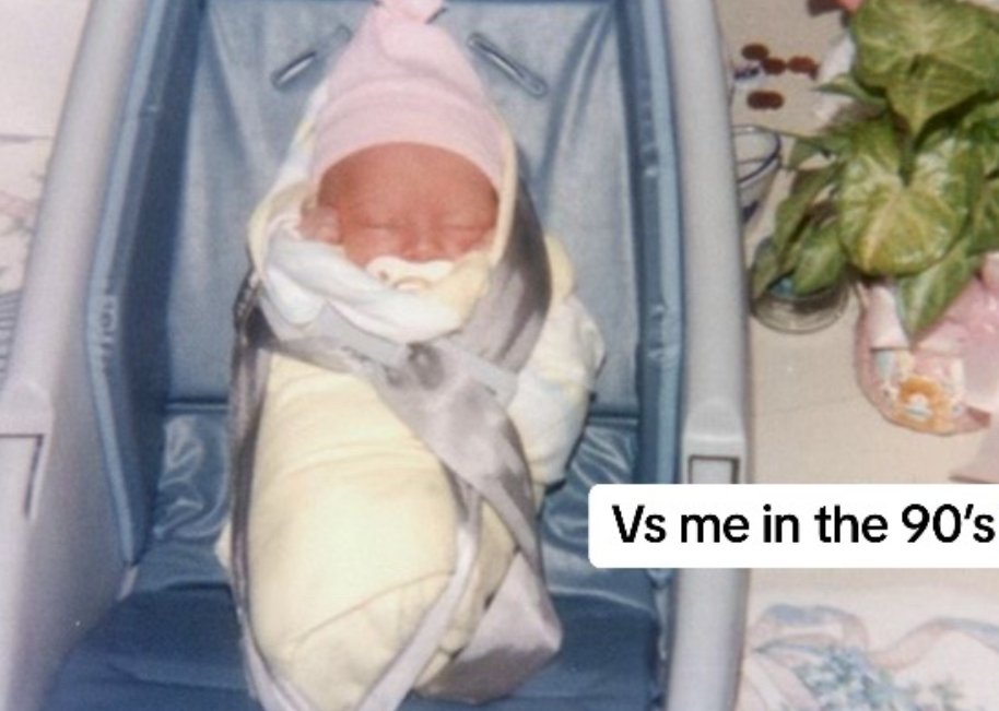 A vintage pic of a baby in an unsafe-looking car seat.