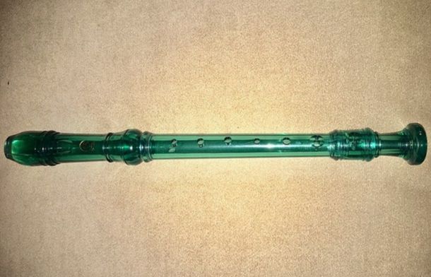 Image shows a standard Yamaha recorder, similar to the ones used in music class to teach the instrument to children.