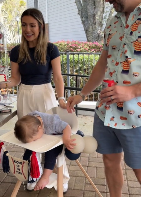 A baby face-plants into the tray table on his first birthday.